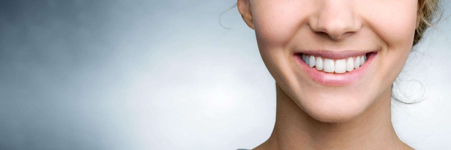 A lady smiling after dental implants in Chico, CA.