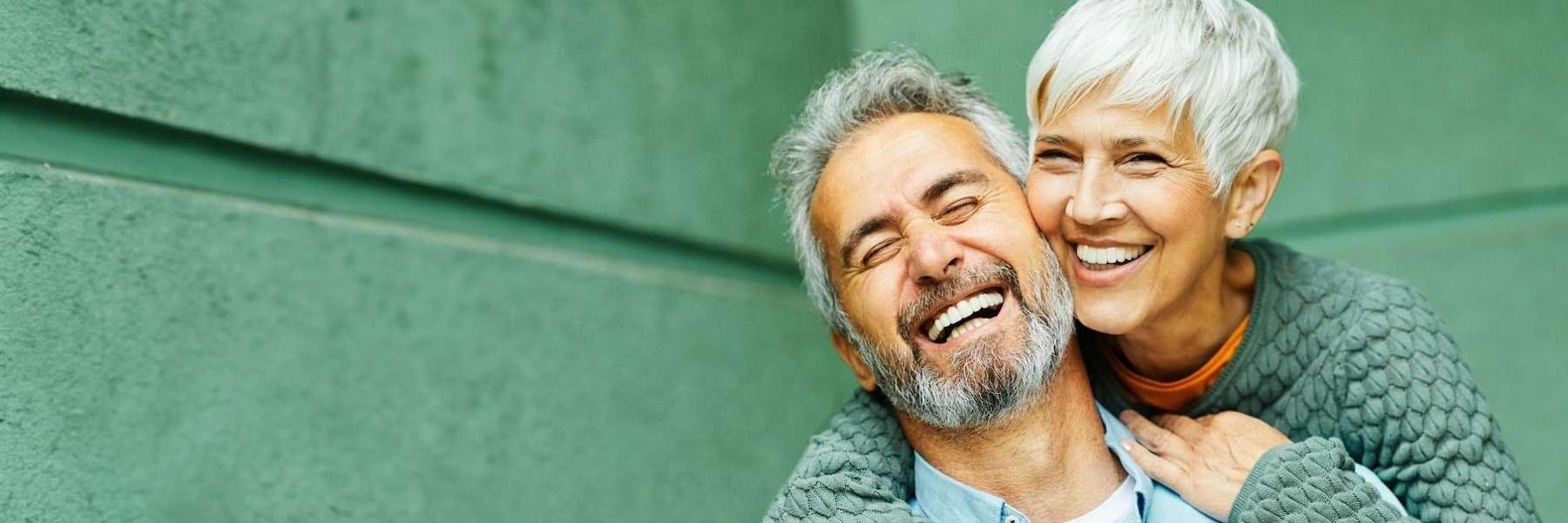 A picture of elderly couple smiling after dental implants at South Chico Dental Care, Chico, CA.