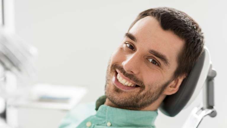 A gentleman smiling after having dental crowns in Chico, CA.