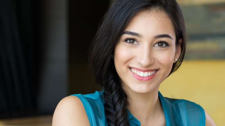 A lady smiling after periodontal care in South Chico, Chico ,CA