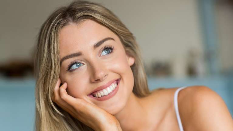 A smiling lady after teeth whitening in Chico, CA.