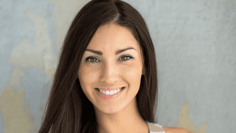 A lady smiling after dental crowns at South Chico Dental Care, Chico CA.