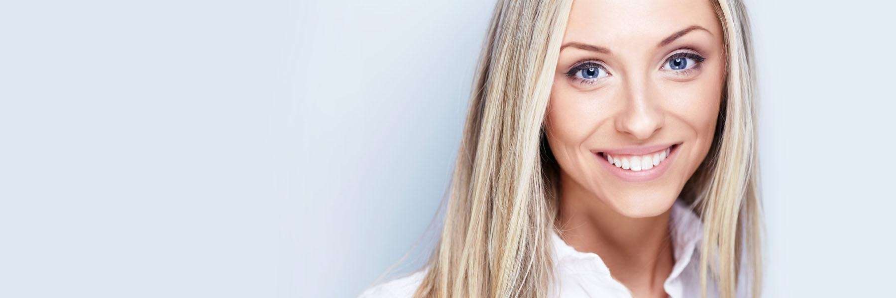 A Lady smiling after periodontal treatment in South Chico Dental Care, CA