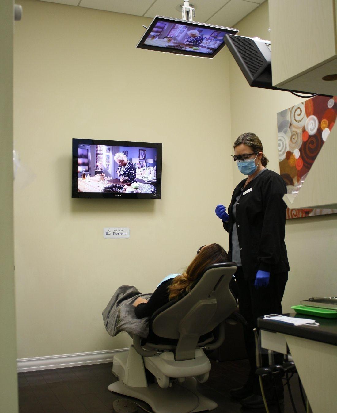 Operatory Dental hygienist and patient in treatment room at South Chico Dental Care in 95928